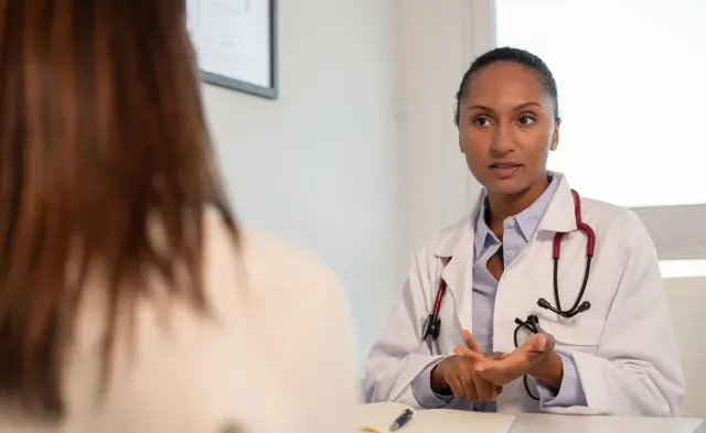 Nurse Practitioner Discussing Treatment Options with Patient